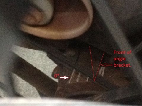 1979 Ford Bronco - Close-up view of an angle bracket with directional arrows and text annotations indicating measurements.