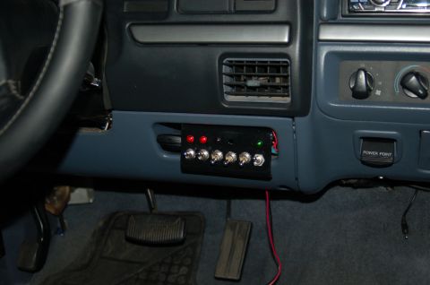 1992 Ford F-150 - Interior view of a 1992 Ford F-150, showing a custom switch panel installed below the air vents.