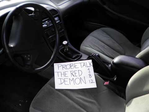 1997 Ford Probe - Interior view of a car's dashboard and seats, with a note on the passenger seat.