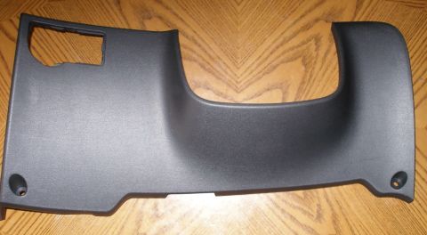 2010 Hyundai Genesis - This is a black plastic interior trim piece, likely from a vehicle's dashboard or console area.