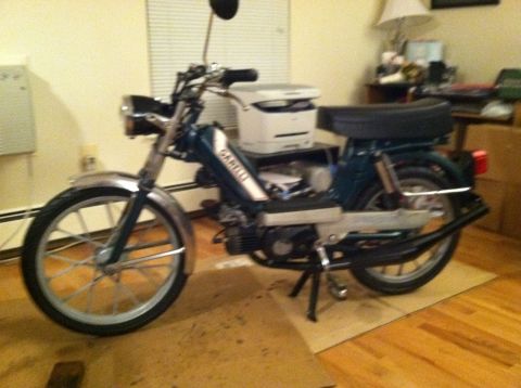 1981 Garelli Rally Sport - Garelli moped with 'GARELLI' text on the side panel, parked indoors.