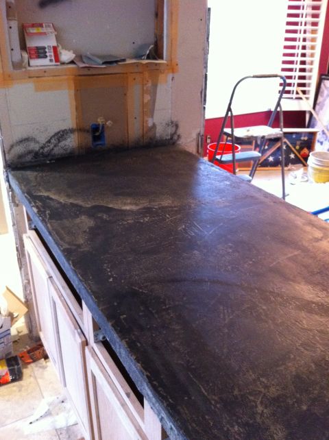 1989 Yugo Cabrio - Countertop installation in progress, showing unfinished cabinets and wall details.