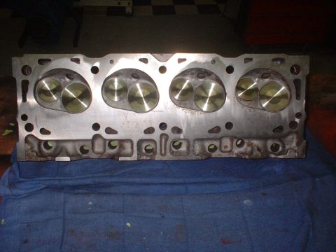 1969 Ford Torino - A close-up view of an engine cylinder head, showing the intake and exhaust valves.