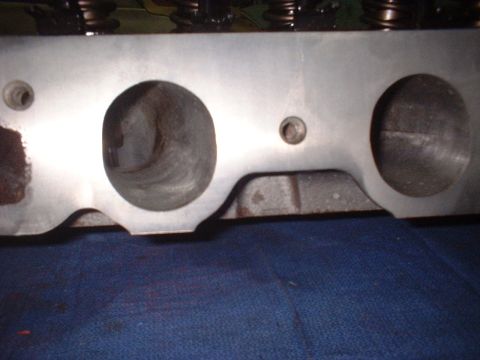 1969 Ford Torino - This is a close-up view of an engine's cylinder head, showing the intake and exhaust ports.