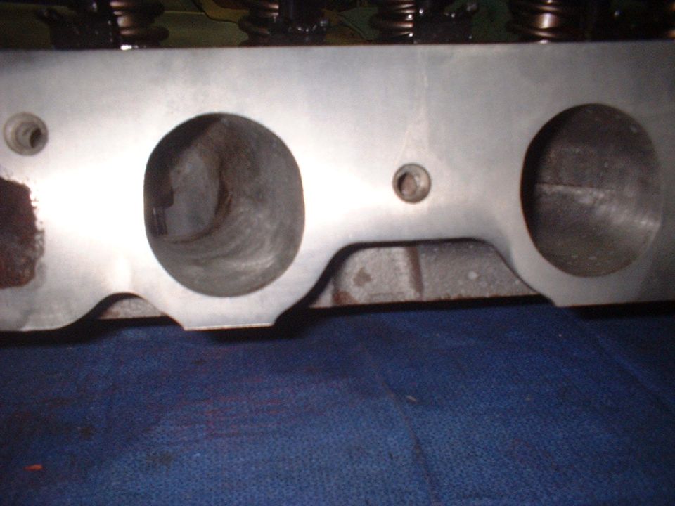 Close-up of an engine cylinder head with two large openings
