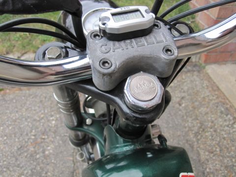 1981 Garelli Rally Sport - Motorcycle handlebars showing the Garelli brand and a digital tachometer.