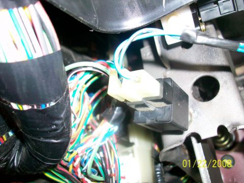 2000 Isuzu Vehicross - A complex network of wires and electrical connectors are visible in this close-up shot of a vehicle's interior wiring.