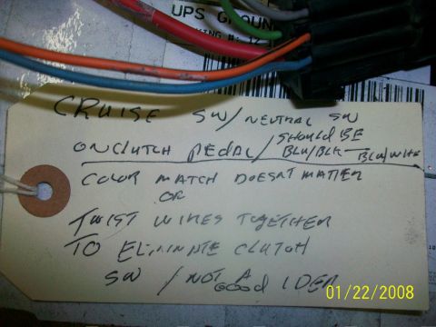 2000 Isuzu Vehicross - A tag attached to electrical wiring provides instructions for cruise and neutral switches, noting color match irrelevance and a method to b…