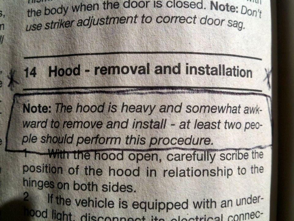 Repair manual section 14 hood removal and installation with two-person note