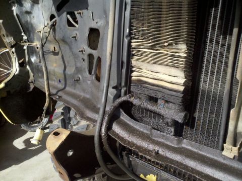 1978 Ford Bronco - Damaged radiator and engine bay components visible in the image.
