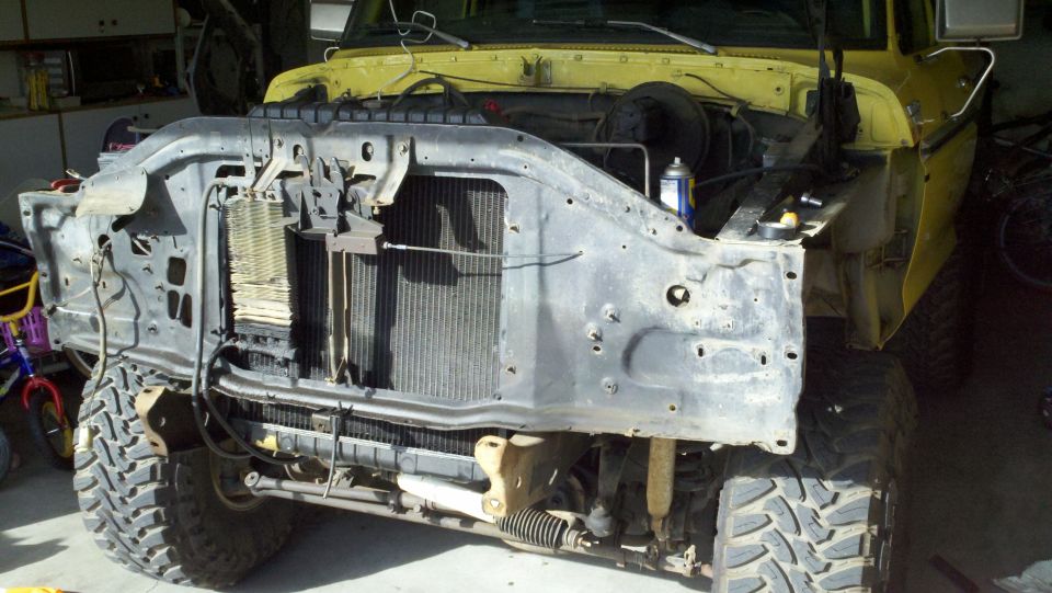 1978 Ford Bronco front end with grille removed, showing radiator and engine components