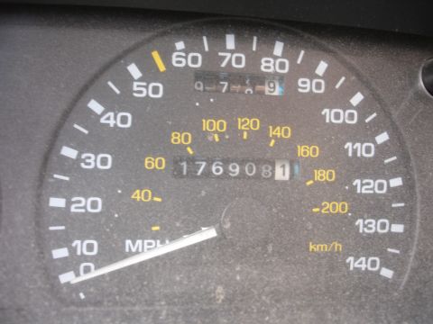 1993 Ford Taurus - The odometer reads 176,908 miles on this vehicle's gauge cluster.
