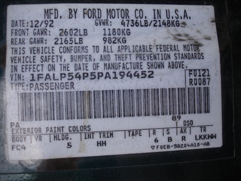 1993 Ford Taurus - This vehicle identification sticker provides manufacturing details, including the date and VIN.