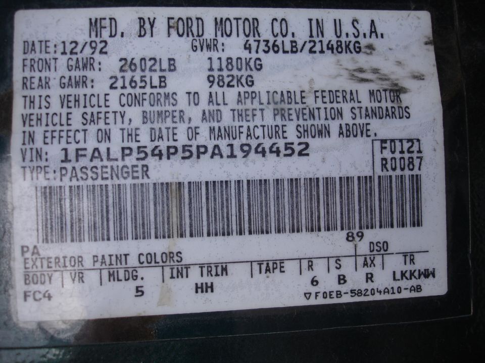 Ford Motor Co. certification label dated 12/92 with VIN 1FALP54P5PA194452, GVWR, GAWR and paint and trim codes