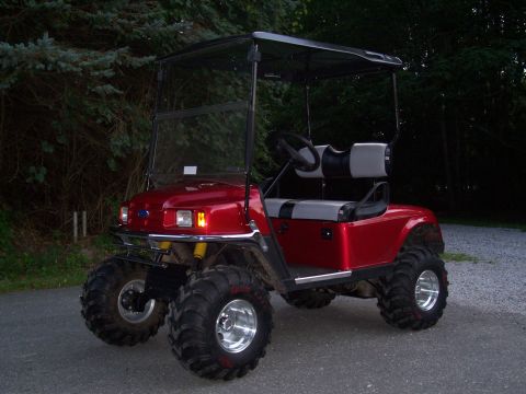 1978 Ford F-150 - This modified golf cart has been equipped with large off-road tires and a lifted suspension.
