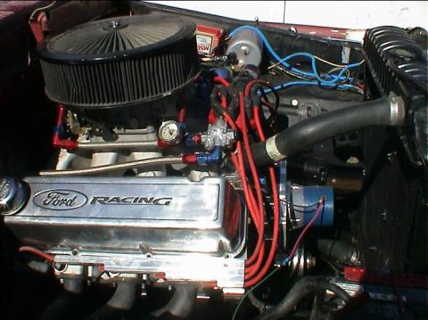 1979 Ford Bronco - Custom engine parts are visible, including a Ford Racing valve cover and a large air intake system.