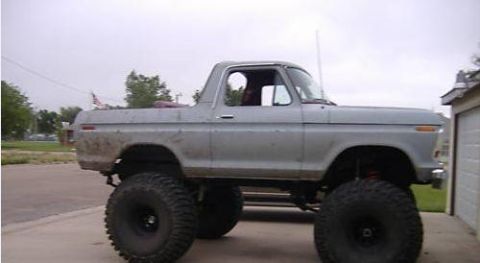 1978 Ford Bronco - This lifted 1978 Ford Bronco features oversized tires and a light blue paint job.