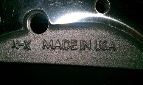 1999 Chevrolet Camaro - This close-up shows a metal component stamped with 'MADE IN USA', indicating its country of origin.