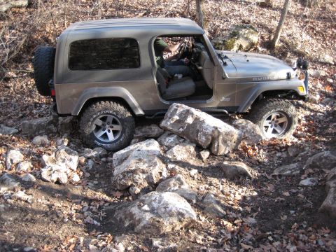 2005 Jeep Wrangler - Jeep Wrangler Rubicon tackling a difficult rocky terrain.