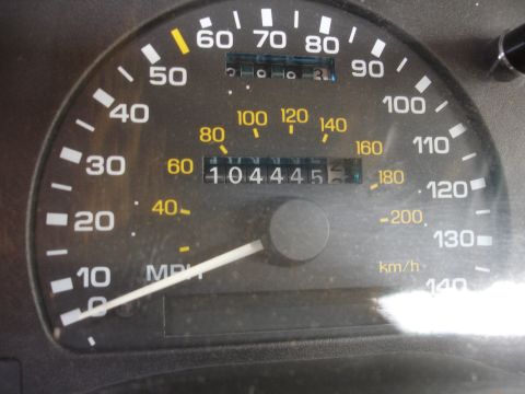 1993 Ford Taurus - Odometer reads 104,445 miles; speedometer shows 0 MPH.