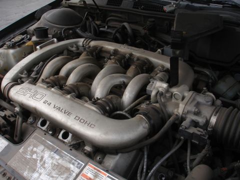 1993 Ford Taurus - Close-up of the SHO 24 Valve DOHC engine, indicating it is from a 1993 Ford Taurus.