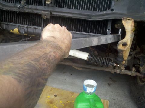 1978 Ford Bronco - Breaker bar got it loose, but it was lifting the radiator clip off of the frame rail as I twisted the nut? Seems stuck on there.