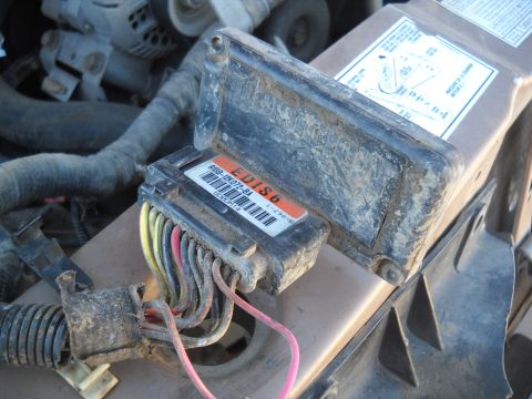 1992 Ford Explorer - Close-up of an EDIS6 engine control module and its wiring harness.