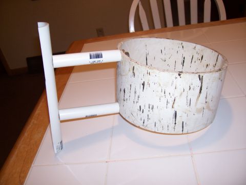 1978 Ford F-150 - A homemade holder constructed from PVC pipes and a white bucket is displayed on a tiled surface.