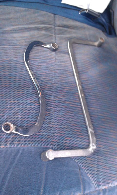 1990 Ford Bronco - Two metal wrenches are placed on blue patterned fabric, possibly inside a vehicle.