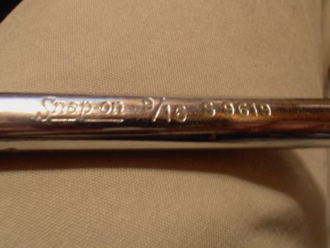 1990 Ford Bronco - Close-up of a Snap-on 9/16 wrench, showing the brand name and part number.