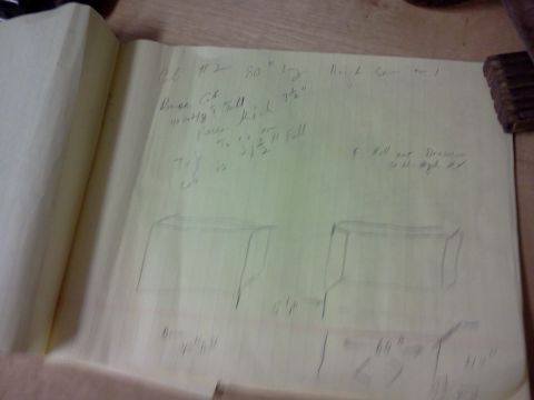 1996 Ford Bronco - Handwritten notes and diagrams are visible on a notebook page, with some text and sketches.