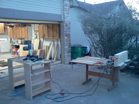 1996 Ford Bronco - Outdoor workshop setup with woodworking tools and materials.