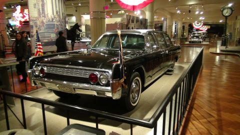1993 Ford Taurus - This limousine, likely from the early 1960s, is on display in a museum setting.