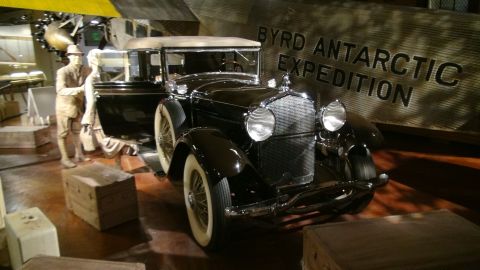 1993 Ford Taurus - A vintage car is displayed in front of signage related to the Byrd Antarctic Expedition.