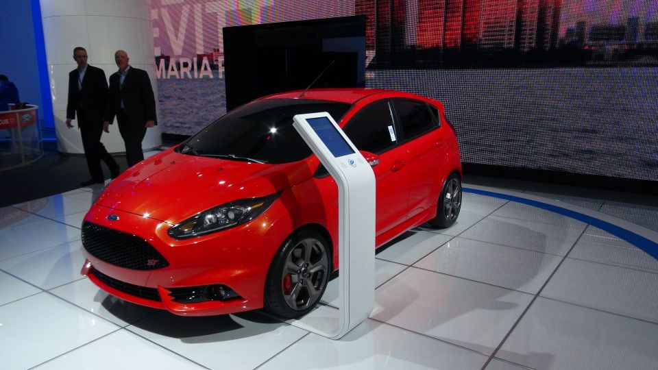 Red hatchback with ST badge on display