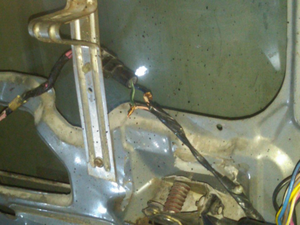Exposed wiring and window mechanism with Supermotors.net logo