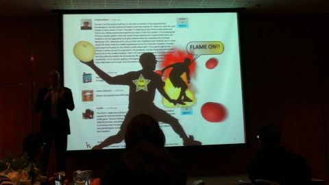 1993 Ford Taurus - A presentation displays a silhouette figure and social media comments on a screen.