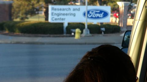 1993 Ford Taurus - Signage for the Ford Research and Engineering Center is visible in the background.