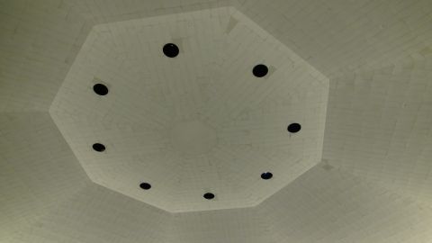 1993 Ford Taurus - The interior of a building features an octagonal ceiling with a central circular element and eight evenly spaced recessed lights.