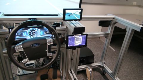 1993 Ford Taurus - This is a car interior simulator, not a real vehicle, a Ford steering wheel and screens.