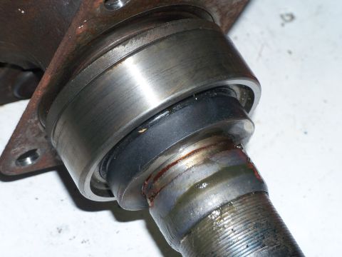 1979 Ford Ranchero - Close-up view of a wheel bearing and spindle assembly, showing signs of wear and lubrication.