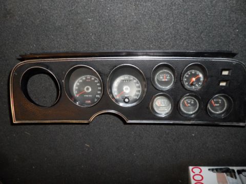 1973 Ford Ranchero - This dashboard instrument cluster is from a 1973 Ford Ranchero and includes a tachometer, speedometer, and auxiliary gauges.