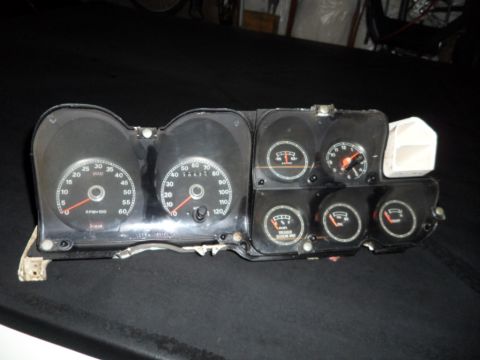 1973 Ford Ranchero - Instrument cluster assembly with multiple gauges, including speedometer and tachometer.