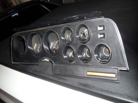 1973 Ford Ranchero - Dashboard instrument cluster from a 1973 Ford Ranchero, several gauges and indicator lights.