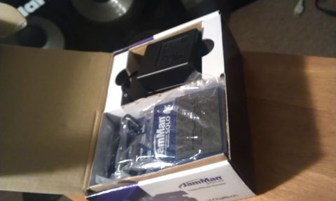 1995 Honda Civic - A JamMan Solo effects pedal is shown inside its packaging, ready for use.