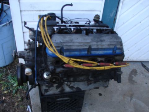 1973 Ford Ranchero - A V8 engine is shown with its spark plug wires connected to the distributor.