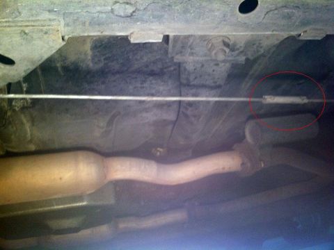 2001 Mercury Grand Marquis - The parking brake cable and exhaust system are visible on the underbody of this 2001 Mercury Grand Marquis.