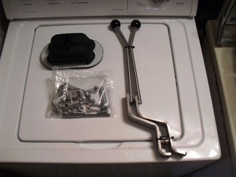 1986 Ford Bronco - Shift lever and boot kit shown on a white surface.