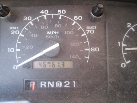 1994 Ford Bronco - Interior view of dashboard gauges, including speedometer and odometer.