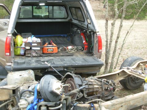 1983 Ford Bronco - I pulled the t-case by hand, but I don't think my back can take any more E4ODs, so I'm using the bed crane again.